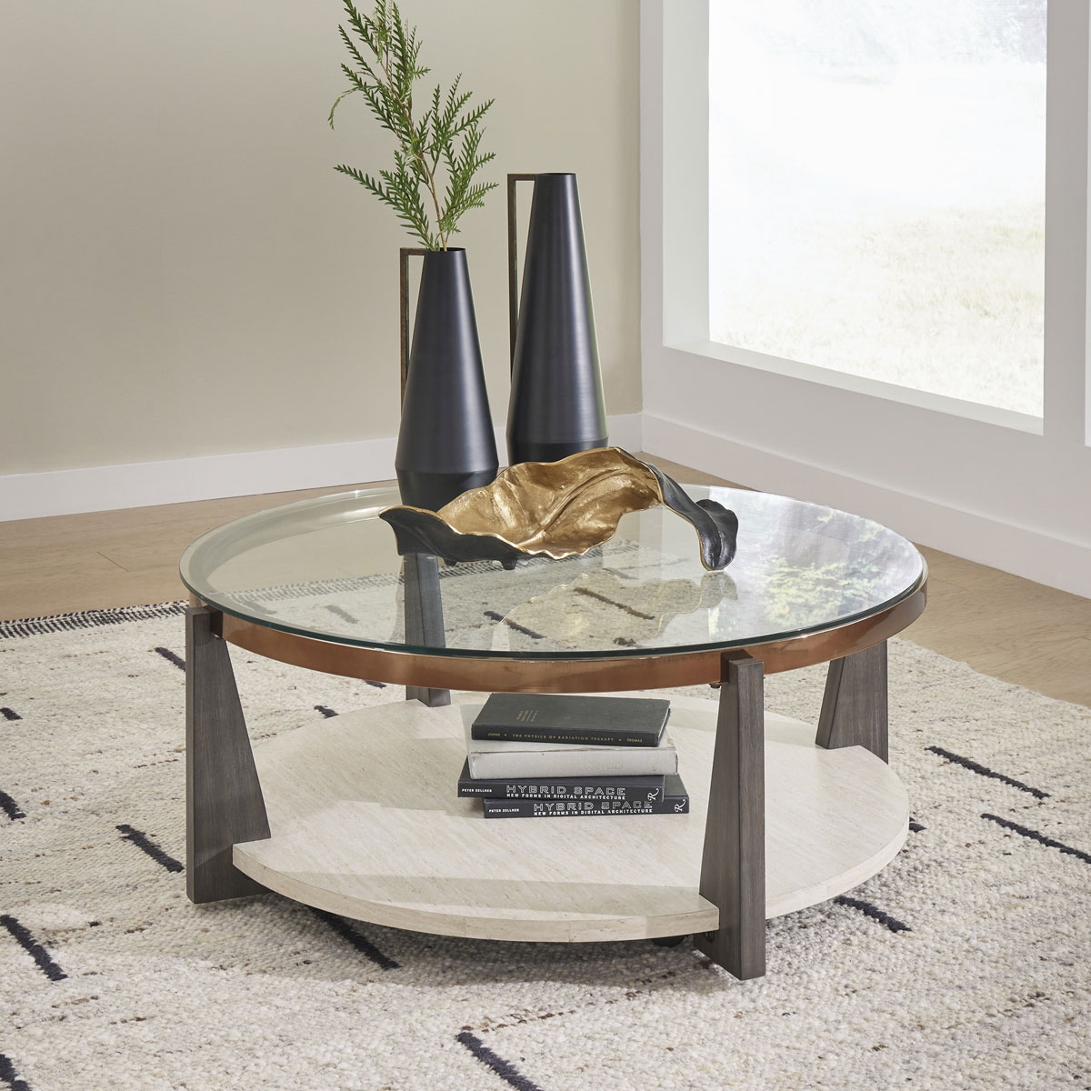 Picture of FRASIER ROUND COCKTAIL TABLE W/ CASTERS